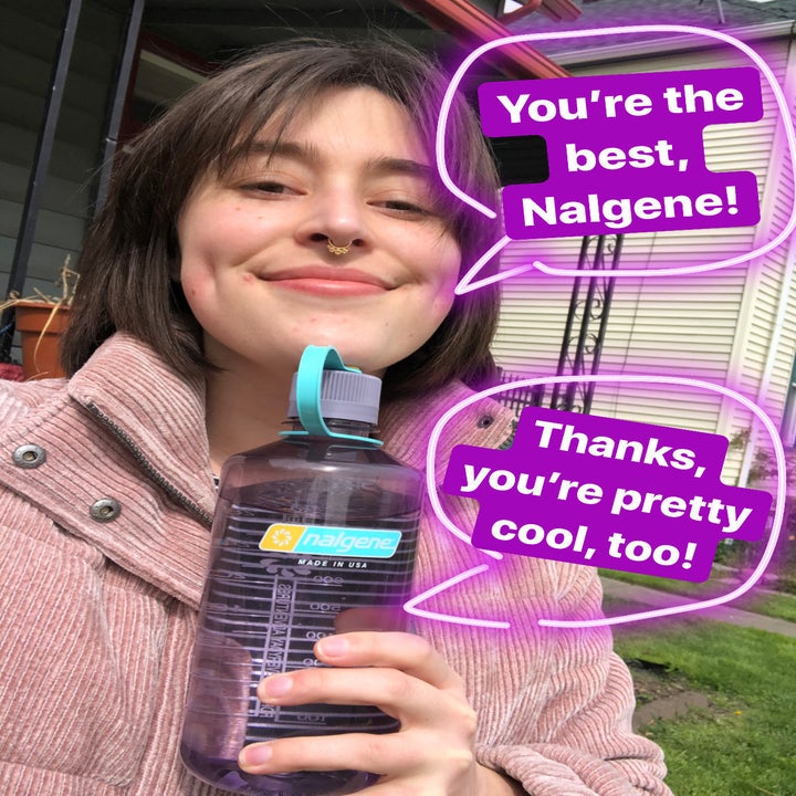 BuzzFeed Writer Rachel Dunkel holding clear purple Nalgene bottle labeled "you're the best, Nalgene" 