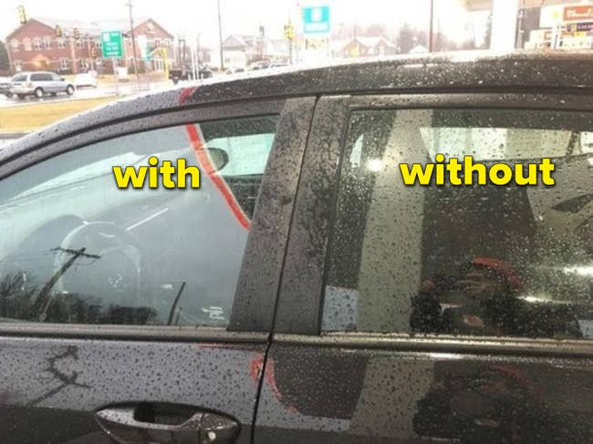 Reviewer's car to show how one window is clear, while the other untreated window is covered in raindrops 
