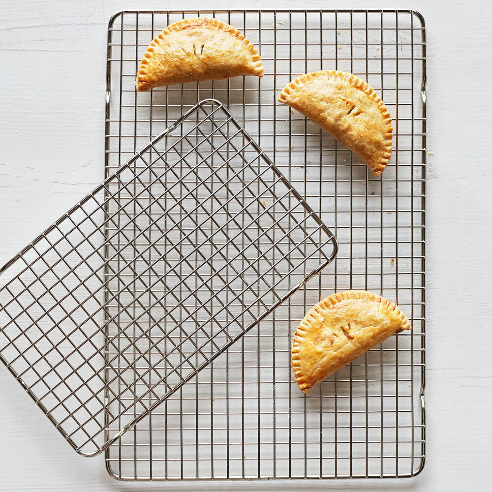the cooling grids in both sizes with freshly made pastries on top