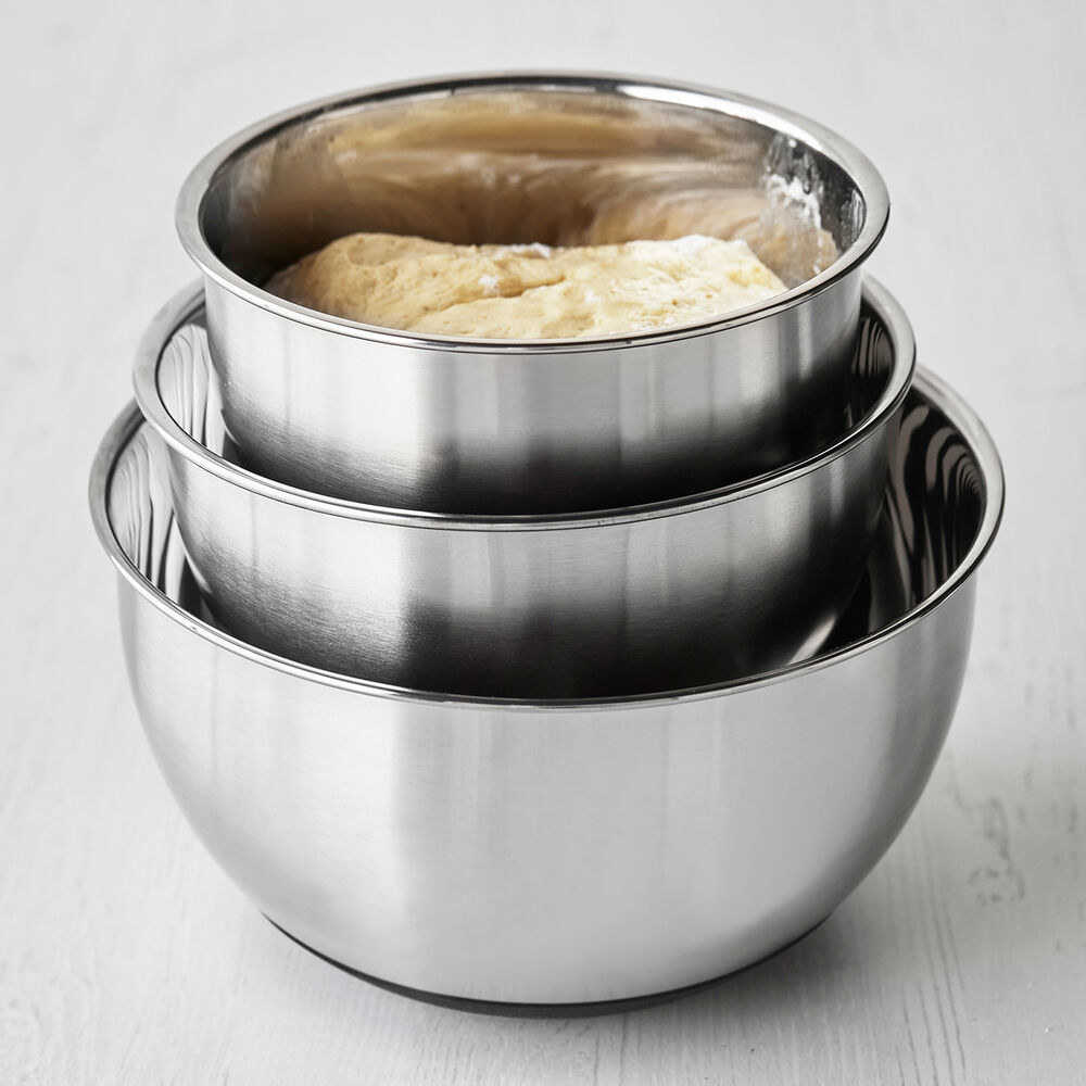 the set of three mixing bowls stacked inside on another