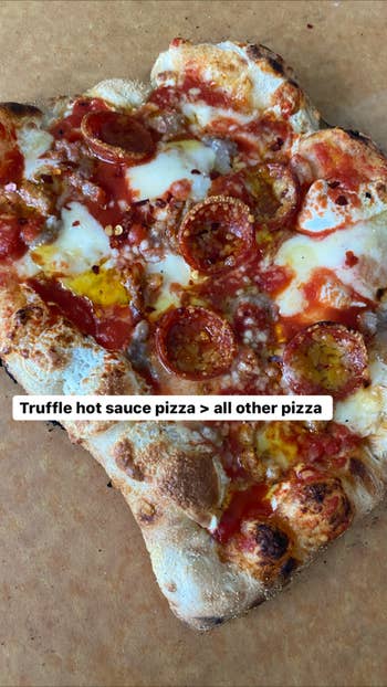 a delicious looking pepperoni pizza with truffle sauce on it and the caption 