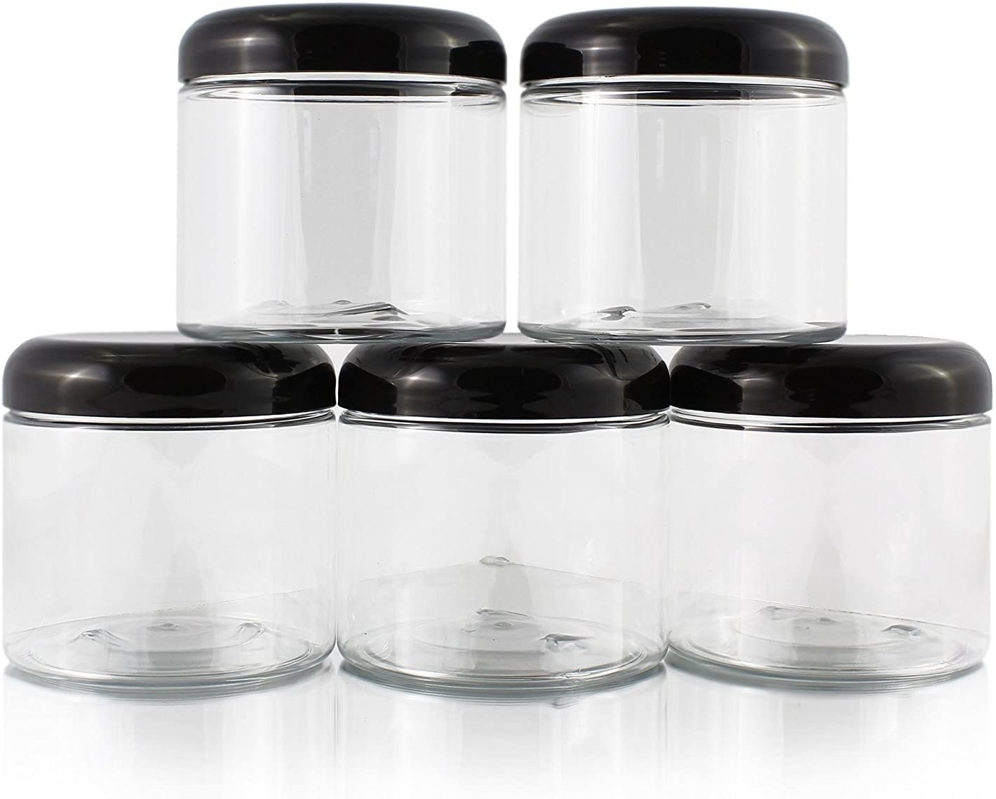 five clear canisters with black dome lids