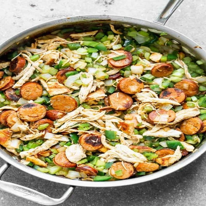 Jambalaya cooking in a pan