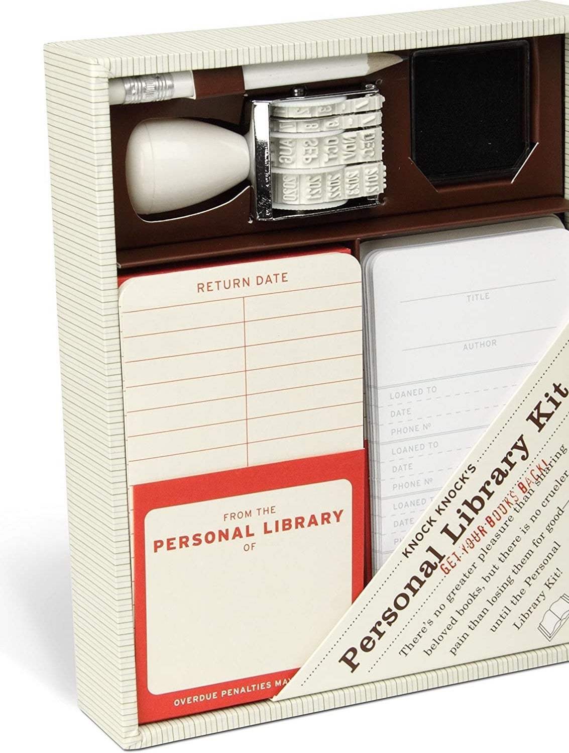 A personal library kit with a stamp with dates, ink, and paper with return dates 