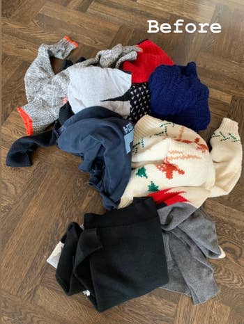 BuzzFeed Shopping reviewer's before picture of a pile of sweaters 