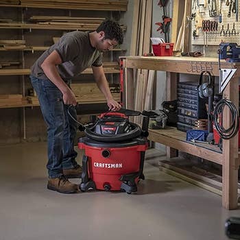 A idiosyncratic lasting successful beforehand of a workbench operating a wet-dry vacuum