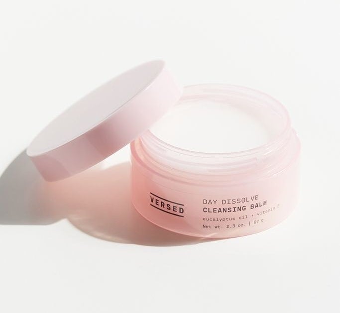 A round, pink tub of the cleansing balm
