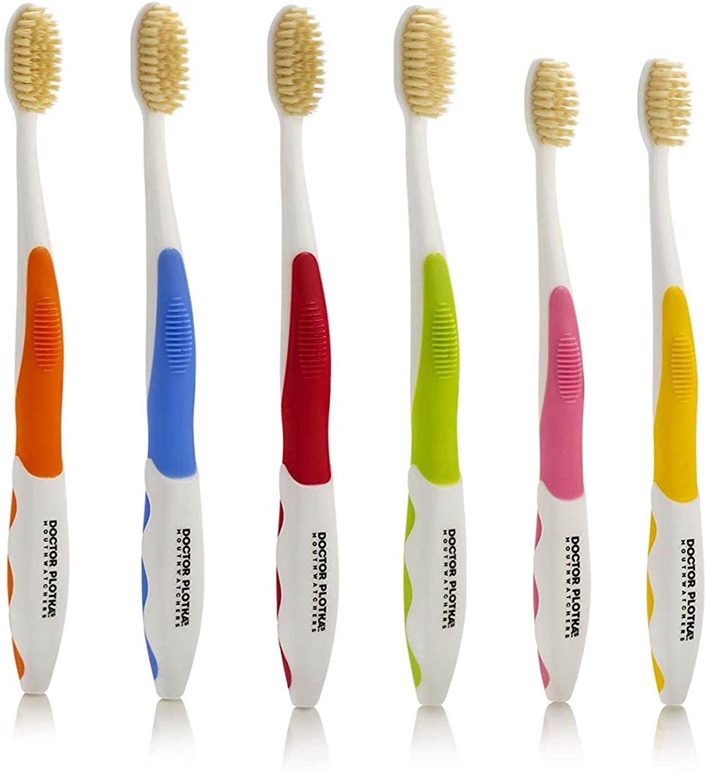 Four large and two small toothbrushes are lined up side by side