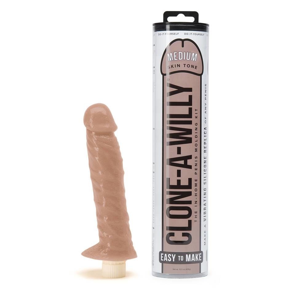 finished cast dildo with a bullet vibrator at the bottom and the kit packaging