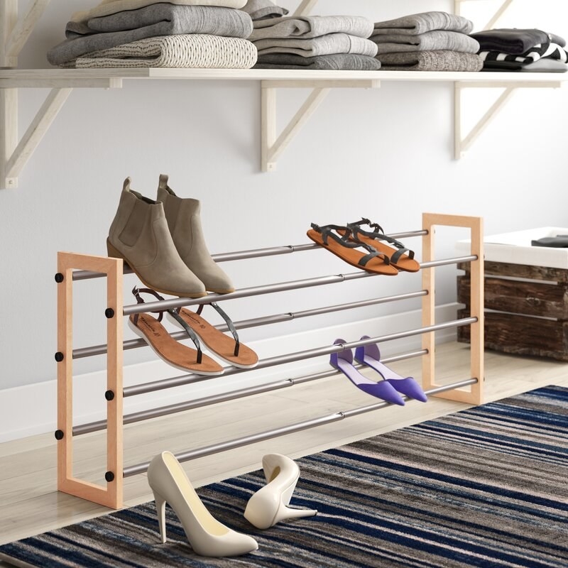 The rack featuring a metal and wood frame