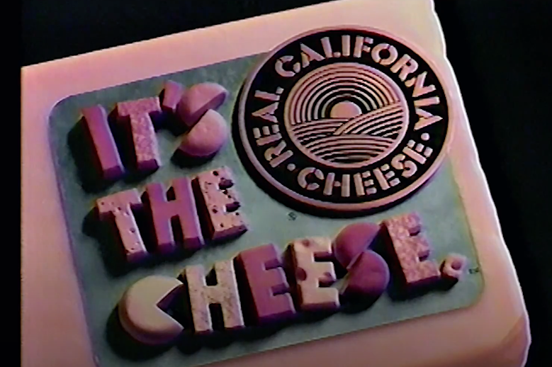 Screenshot of cheese spelling out &quot;It&#x27;s the cheese&quot;