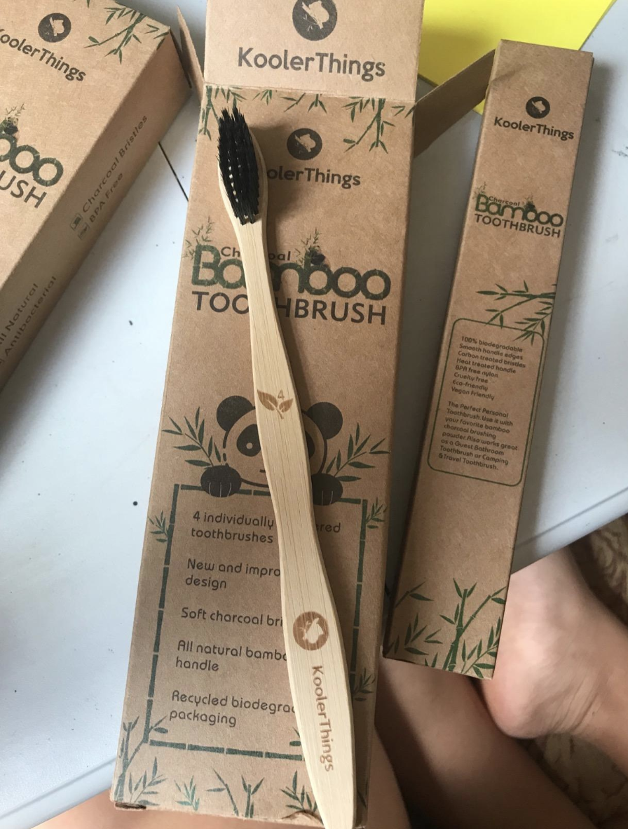 A reviewer image of a bamboo toothbrush