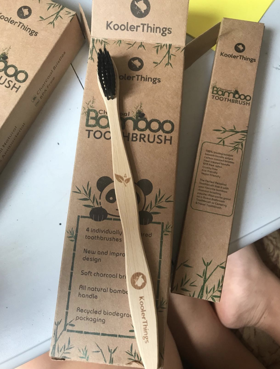 A reviewer image of a bamboo toothbrush 