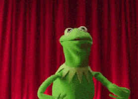 Kermit the frog doing a happy dance 