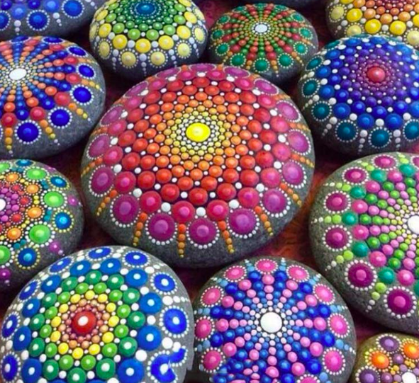 Several multi-colored painted rocks