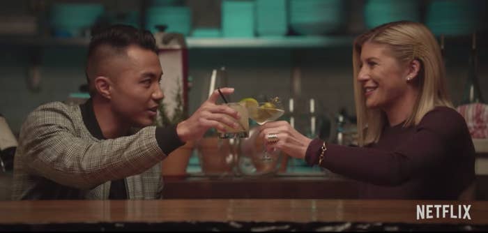 One of the couples from "Dating Around" holds up their drinks and says cheers probably.