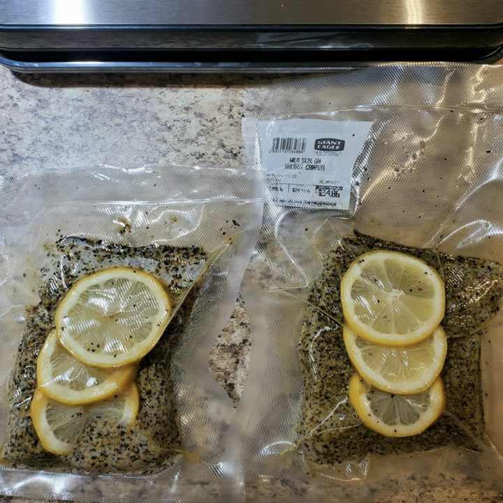reviewer photo of salmon with lemon in clear bags 