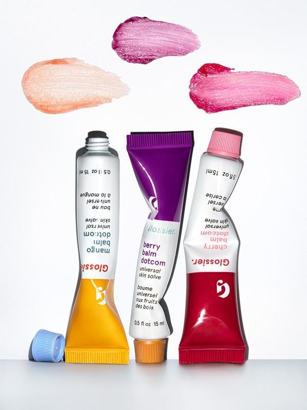 three tubes of lip balm in various sheer shades