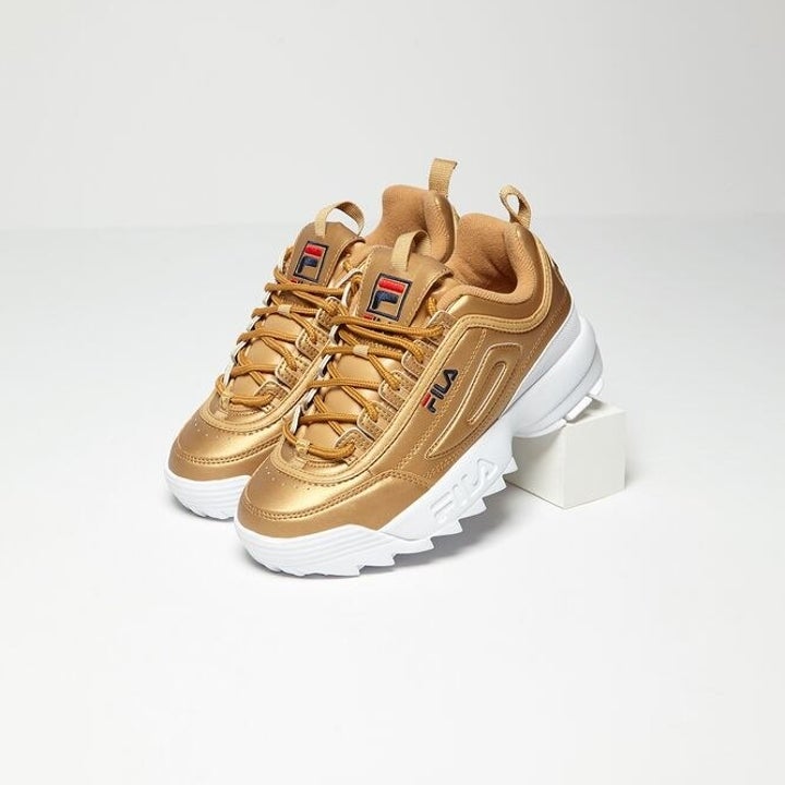 gold fila sneakers