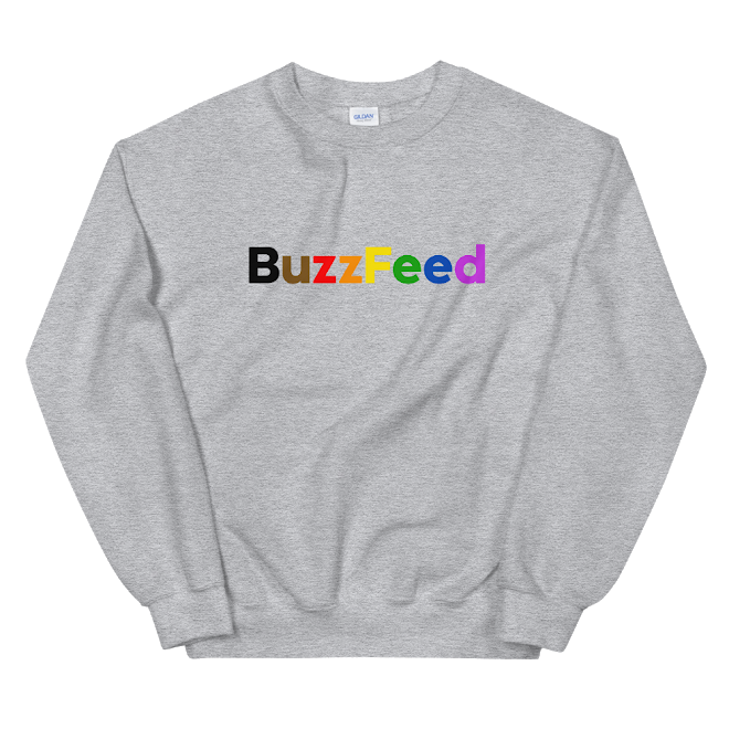 A gray sweatshirt that says &quot;BuzzFeed&quot; across the chest with in rainbow colors