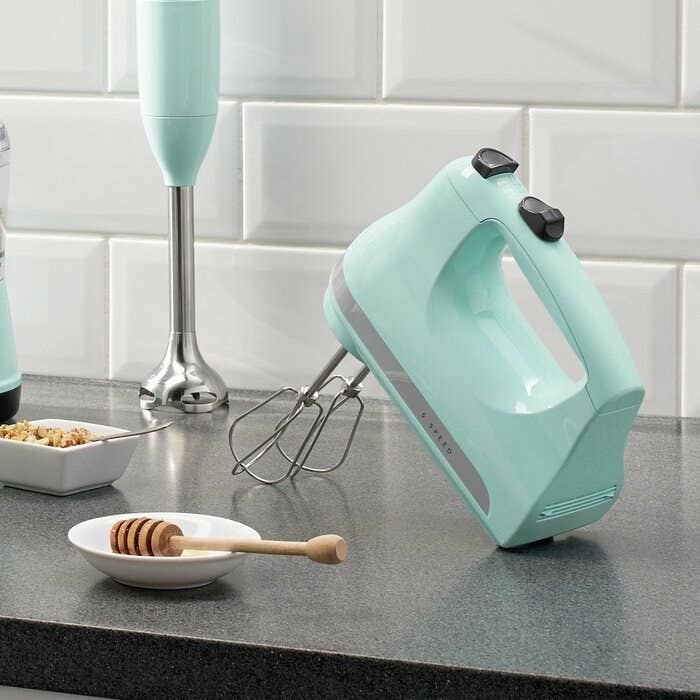 The mixer in pastel blue resting upright
