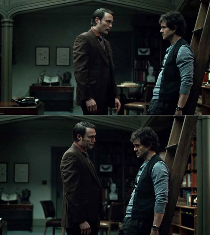 Hannibal and Will looking at each other, while Will leans up against a ladder