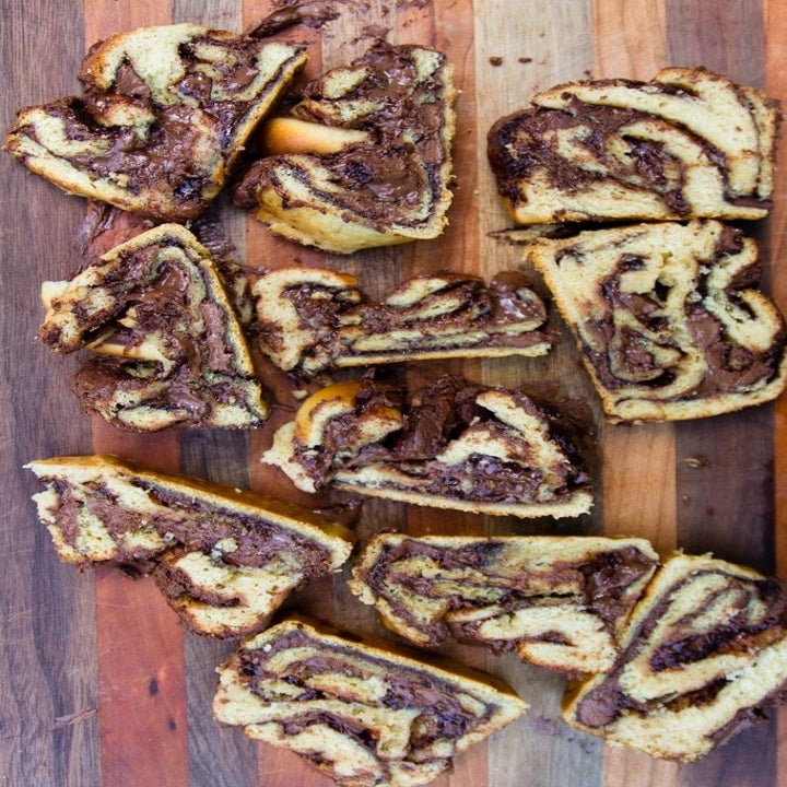 The chocolate babka cut into slices with chocolate marbling on each piece. 