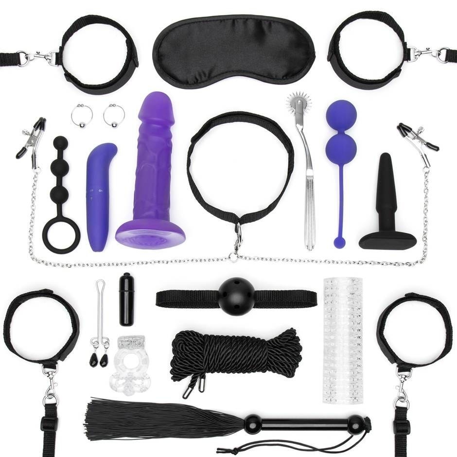 The 20-piece Lovehoney All You Need Bondage Kit laid out