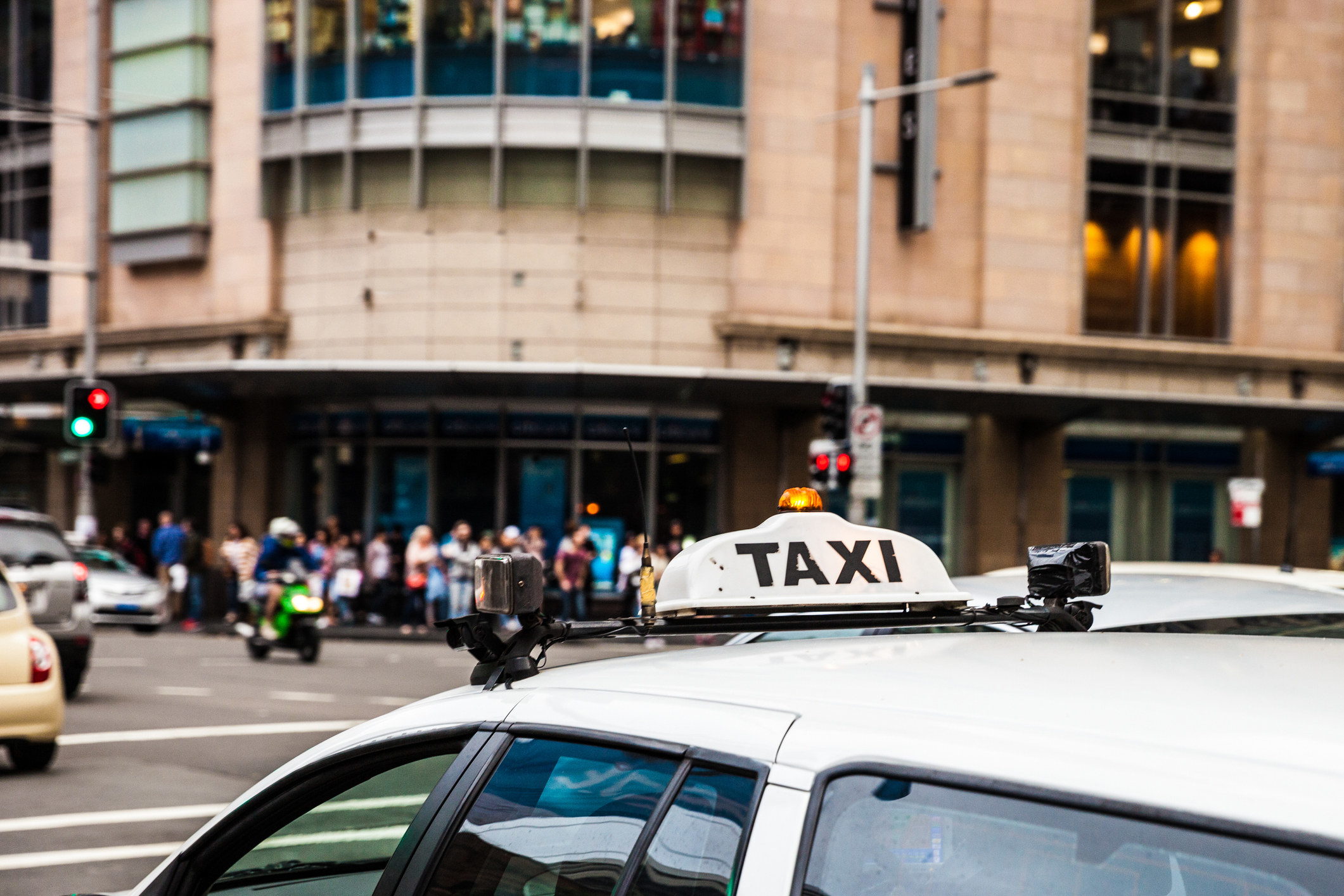 the roof of a taxi driving in Sydney, Australia