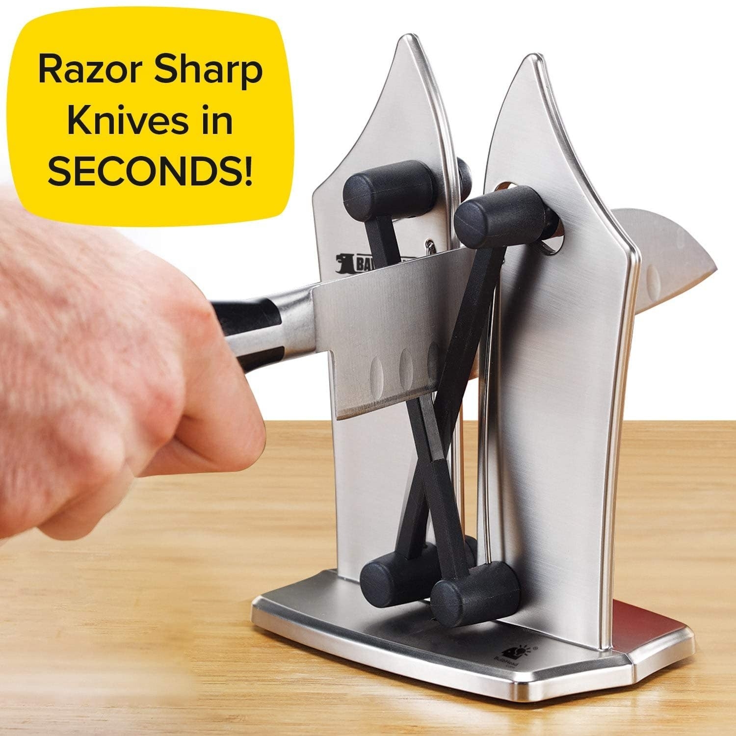 person pulling a knife through the sharpener