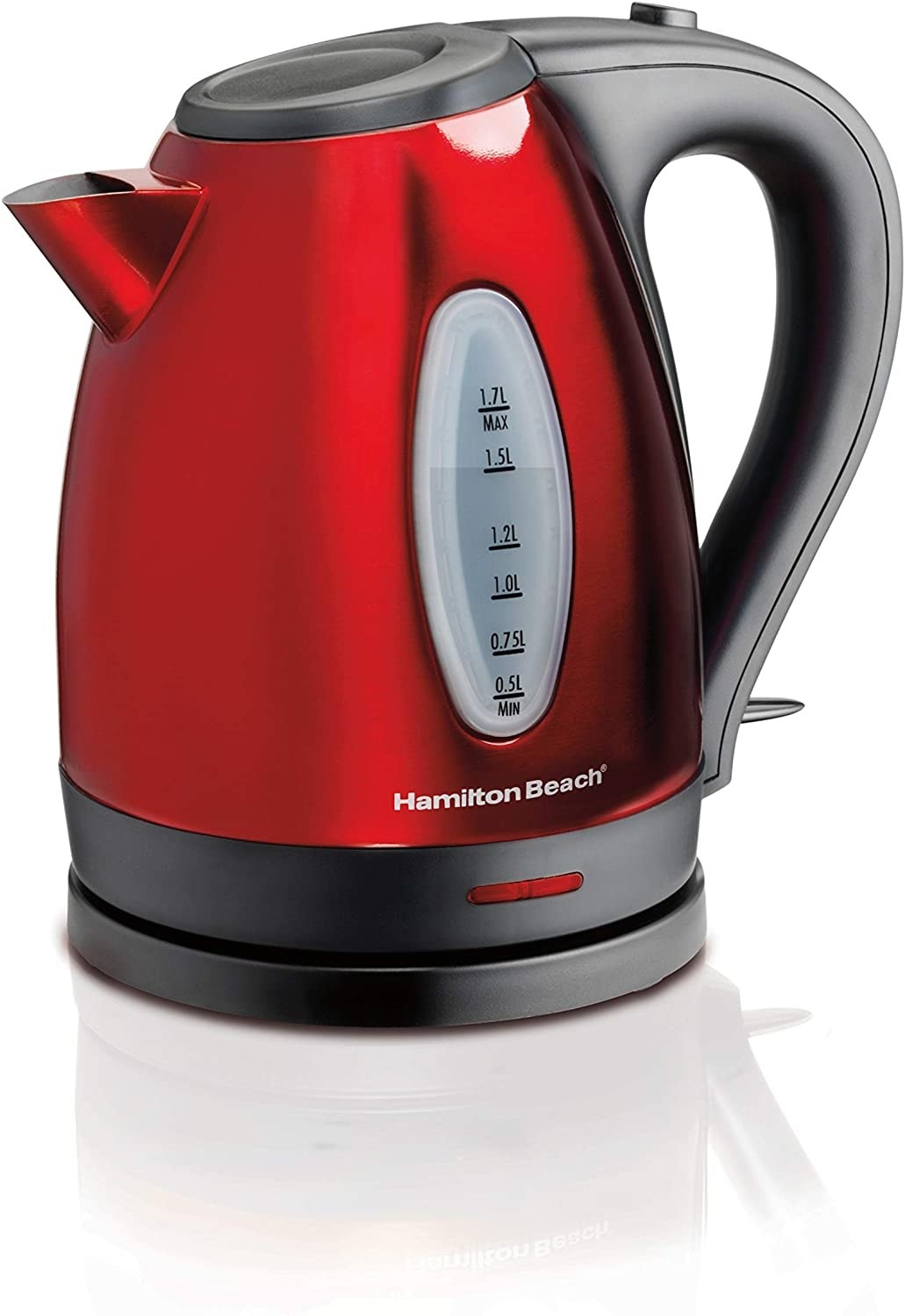 A bright red electric teak kettle with a black base and handle and a plastic measuring window