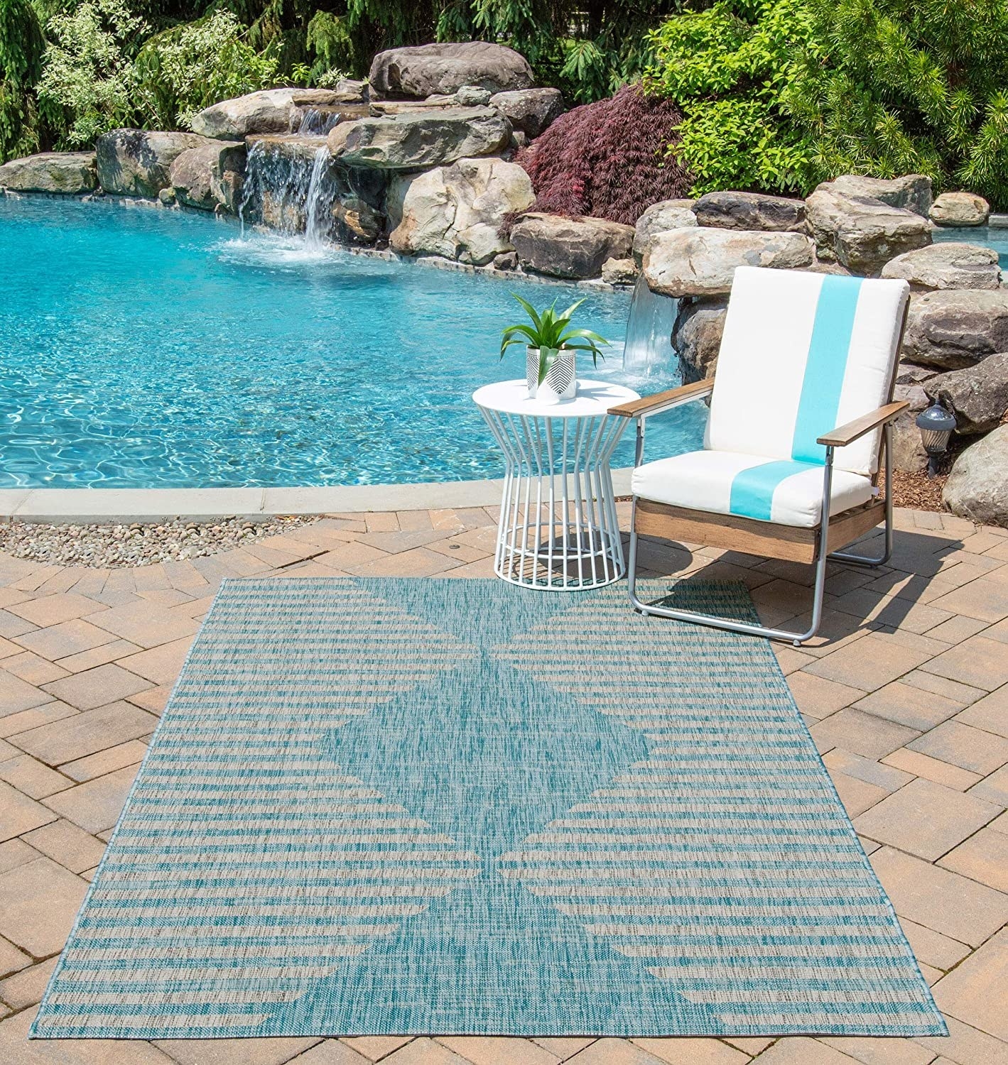 The Novogratz rug in aqua.