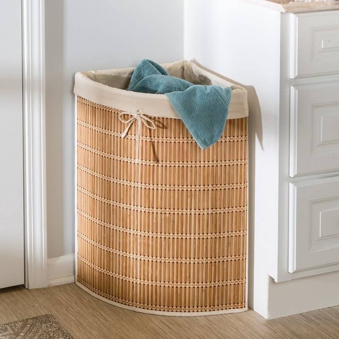 The hamper with a towel inside
