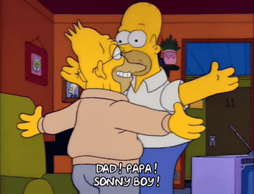 A GIF of Grampa Simpson hugging Homer and the text &#x27; Dad! Papa! Sonny Boy!&#x27; under it.