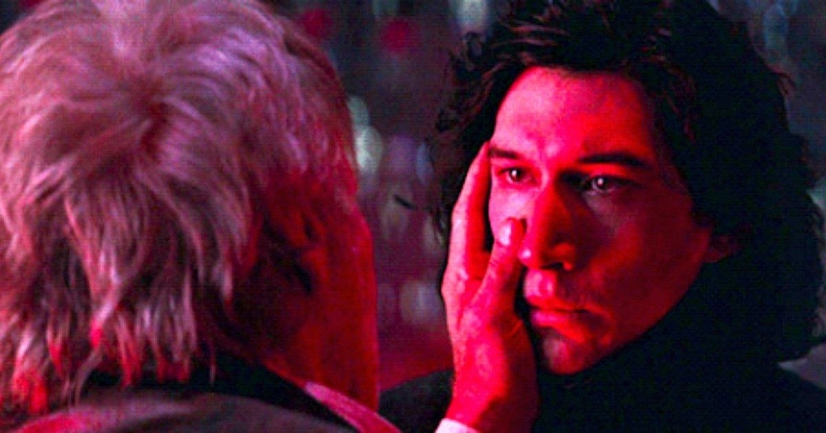 Han Solo touches Kylo Ren&#x27;s face in The Force Awakens.