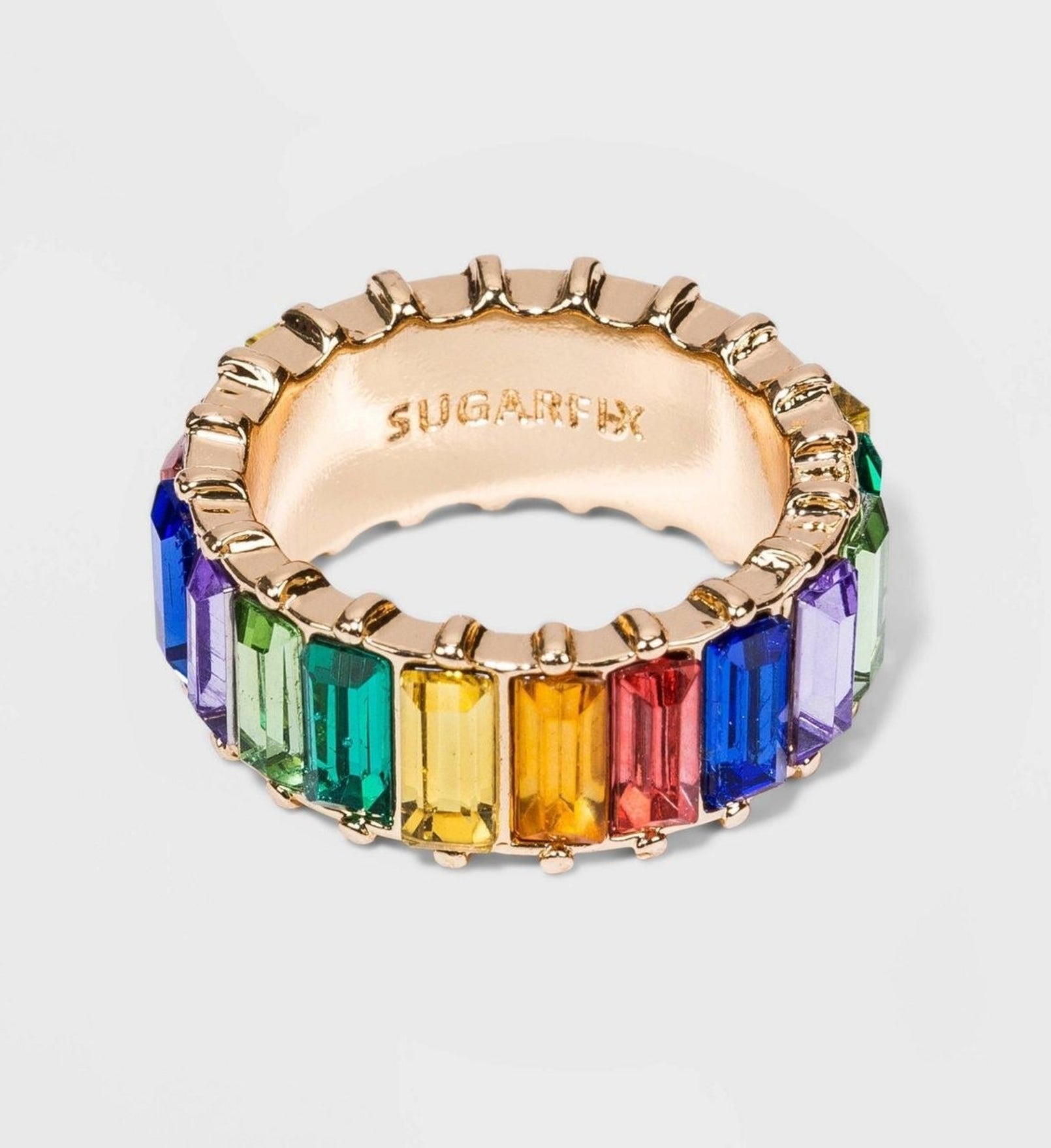 Ring with rectangular crystals in rainbow colors around the whole thing