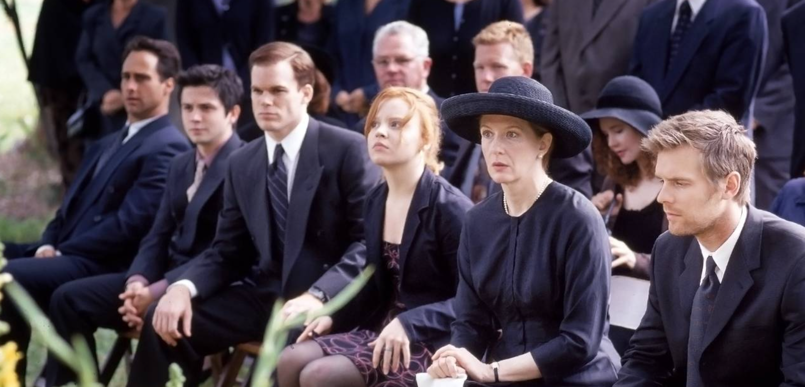 Screenshot of the Fisher family at the patriarch&#x27;s funeral 