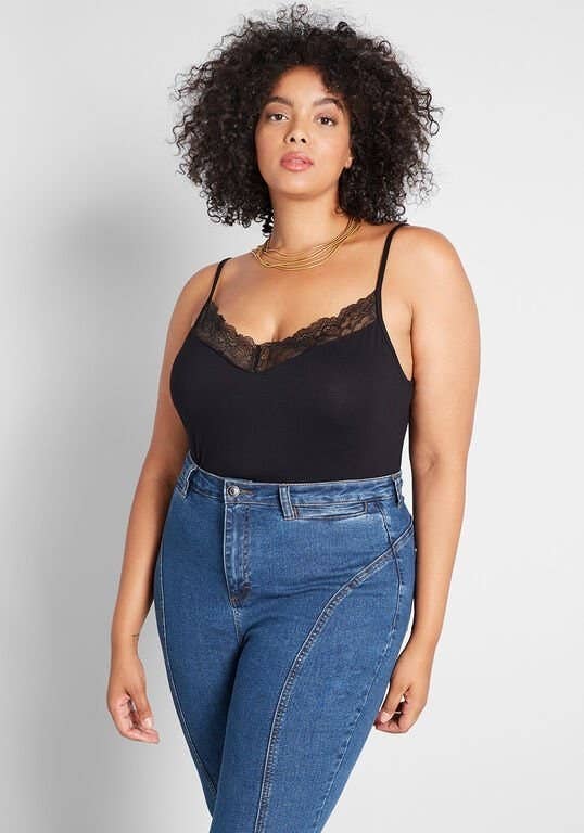 A model in the tank in black with lace at the slight-v neckline