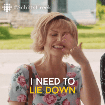 Jocelyn from Schitt&#x27;s Creek fanning herself and saying, &quot;I need to lie down&quot;