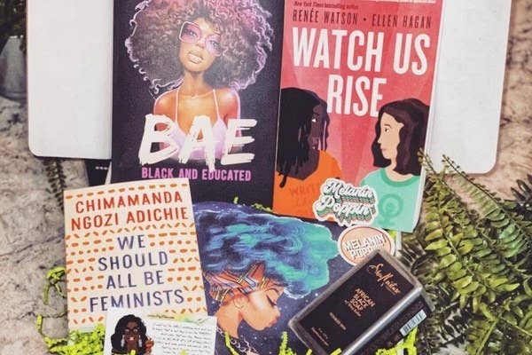 An example of the books and products received in each monthly box