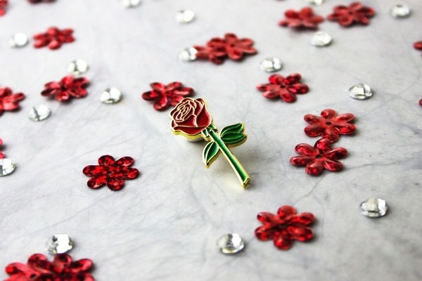 A rose enamel pin