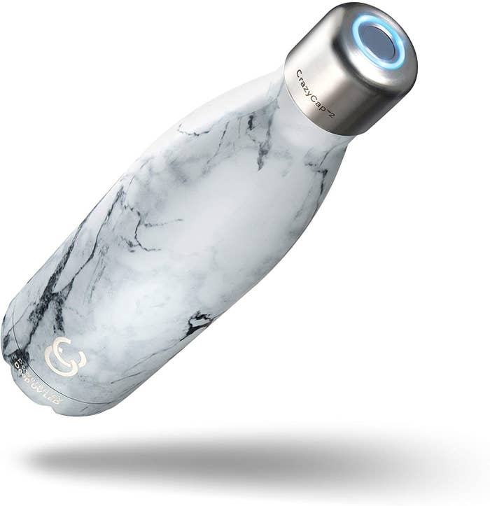 A white and black marble-print waterbottle with a twist off santizing cap 