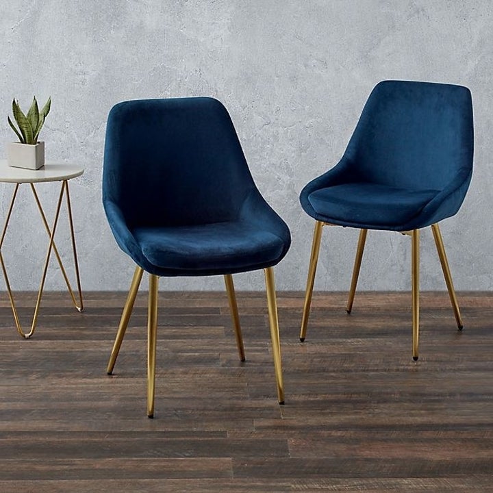 blue velvet chair with copper legs