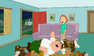 Peter Griffin from Family Guy rolling around with a bunch of puppies. 
