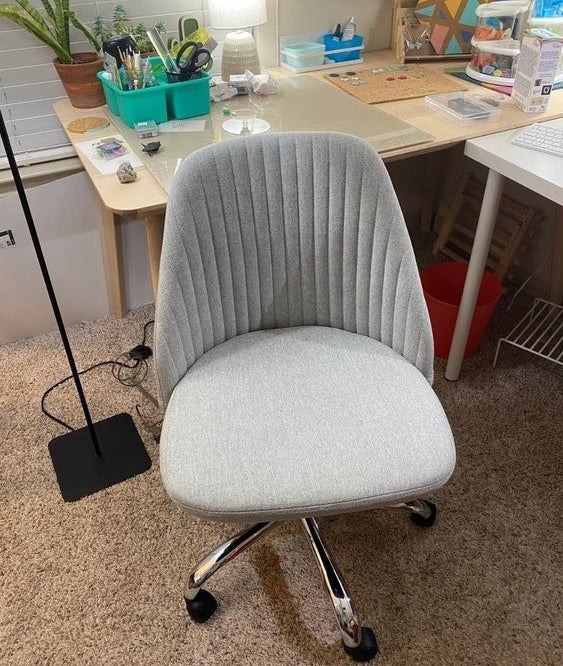Reviewer&#x27;s photo of the fabric grey desk chair with quilted back 