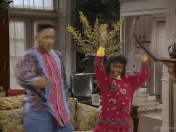 GIF from Fresh Prince of Bel-Air showing Will and Ashley dancing excitedly 