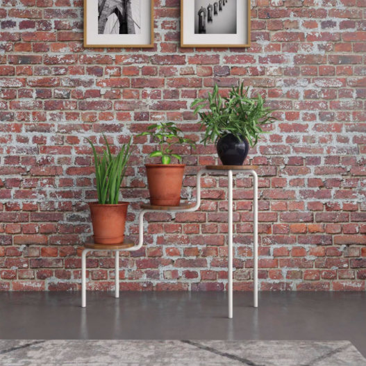 three tier plant stand with thin white legs and natural wood surfaces 