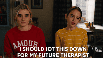 Two girls look at each other as one says, &quot;I should jot this down for my future therapist.&quot;