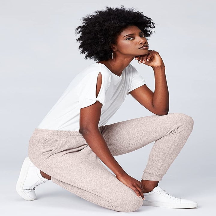 model wearing the joggers in light pink 