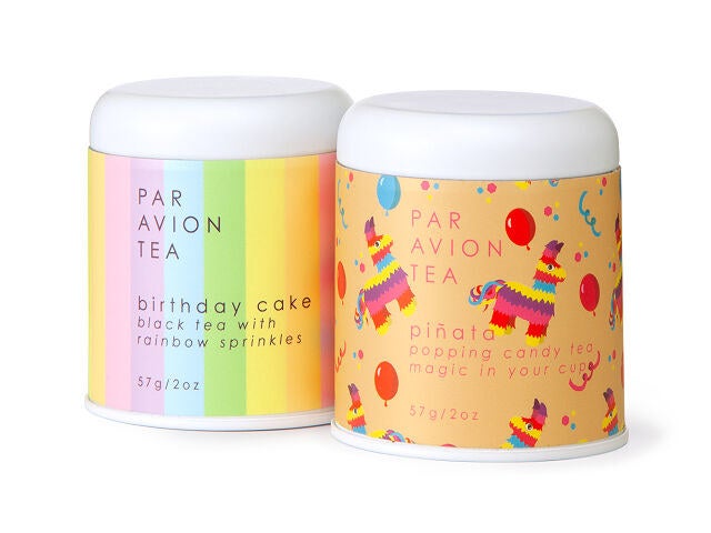 the birthday tea in its colorful canisters 